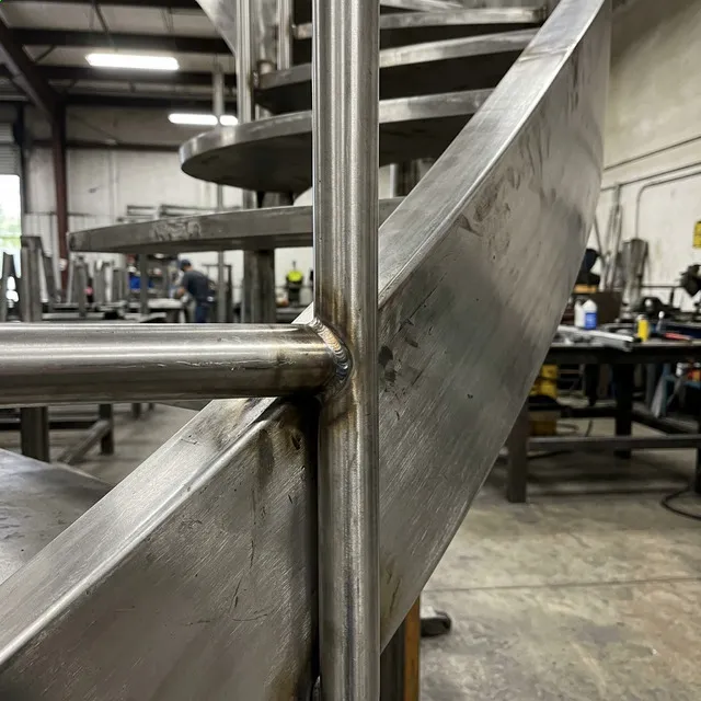 Curved Cantilevered Staircase Design — installation detail